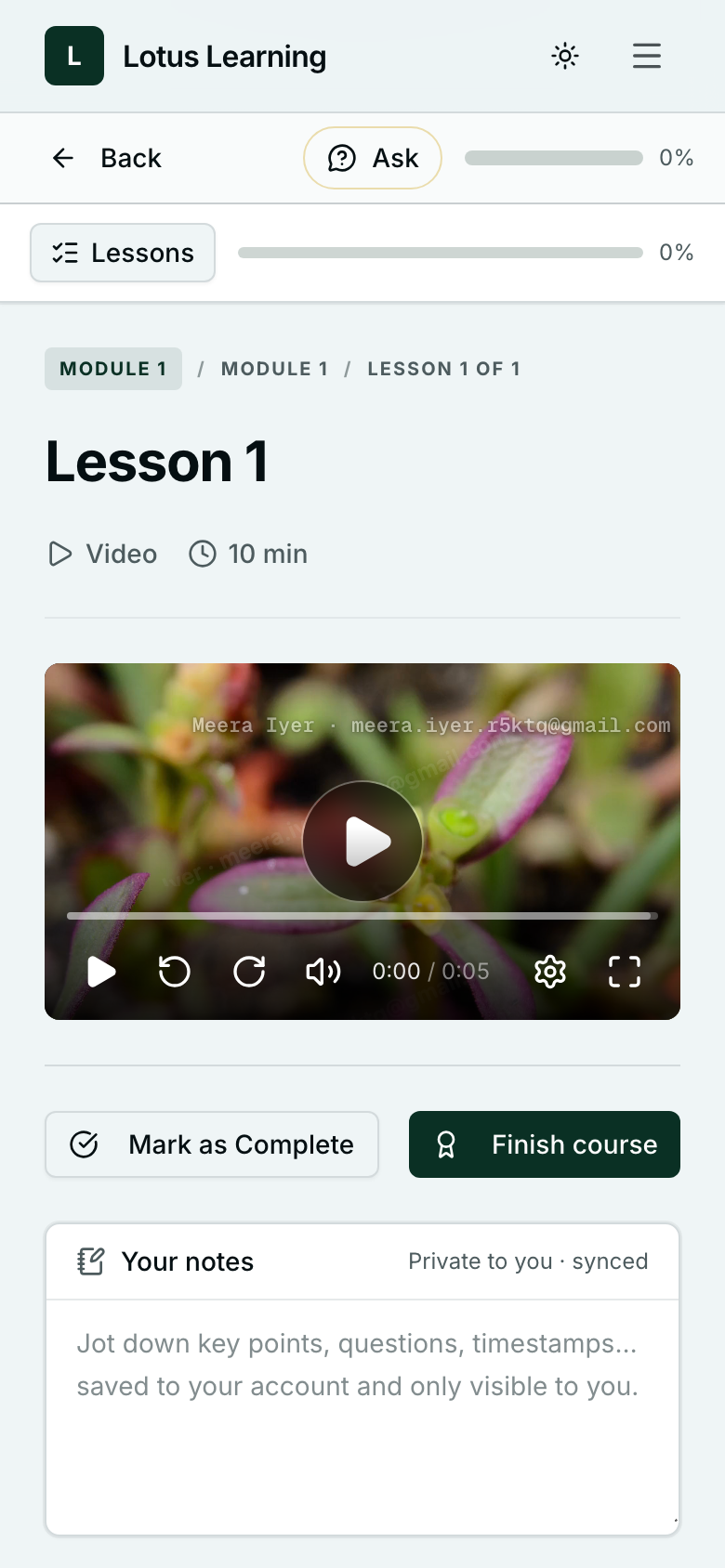 A lesson open on a phone straight after enrolling, with the lesson video ready to play and Mark as Complete below it.